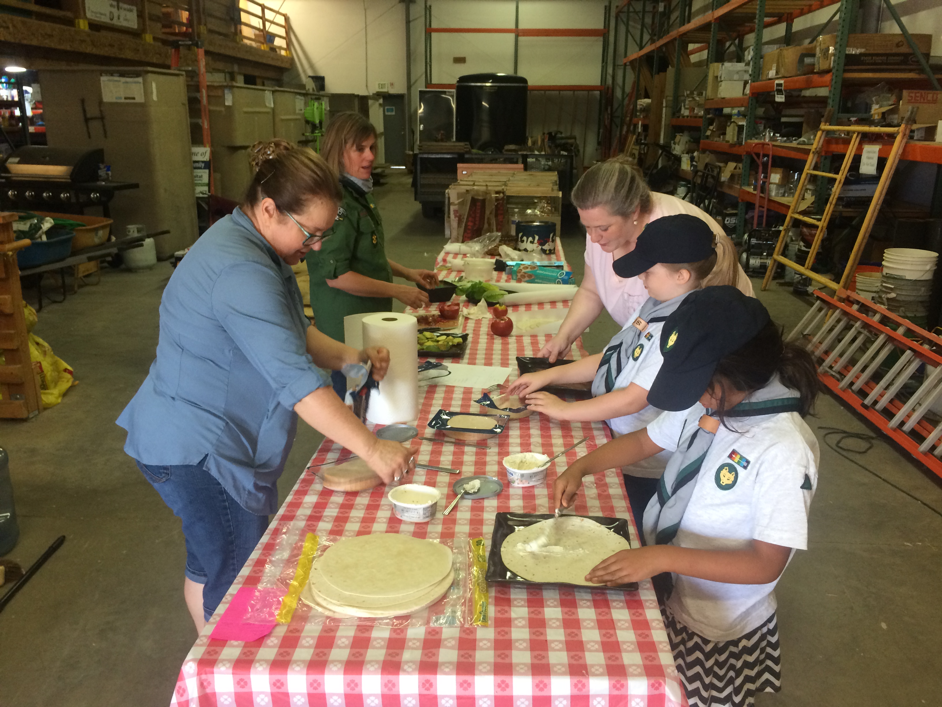 BPA Scouts making lunch for the Women Volunteers